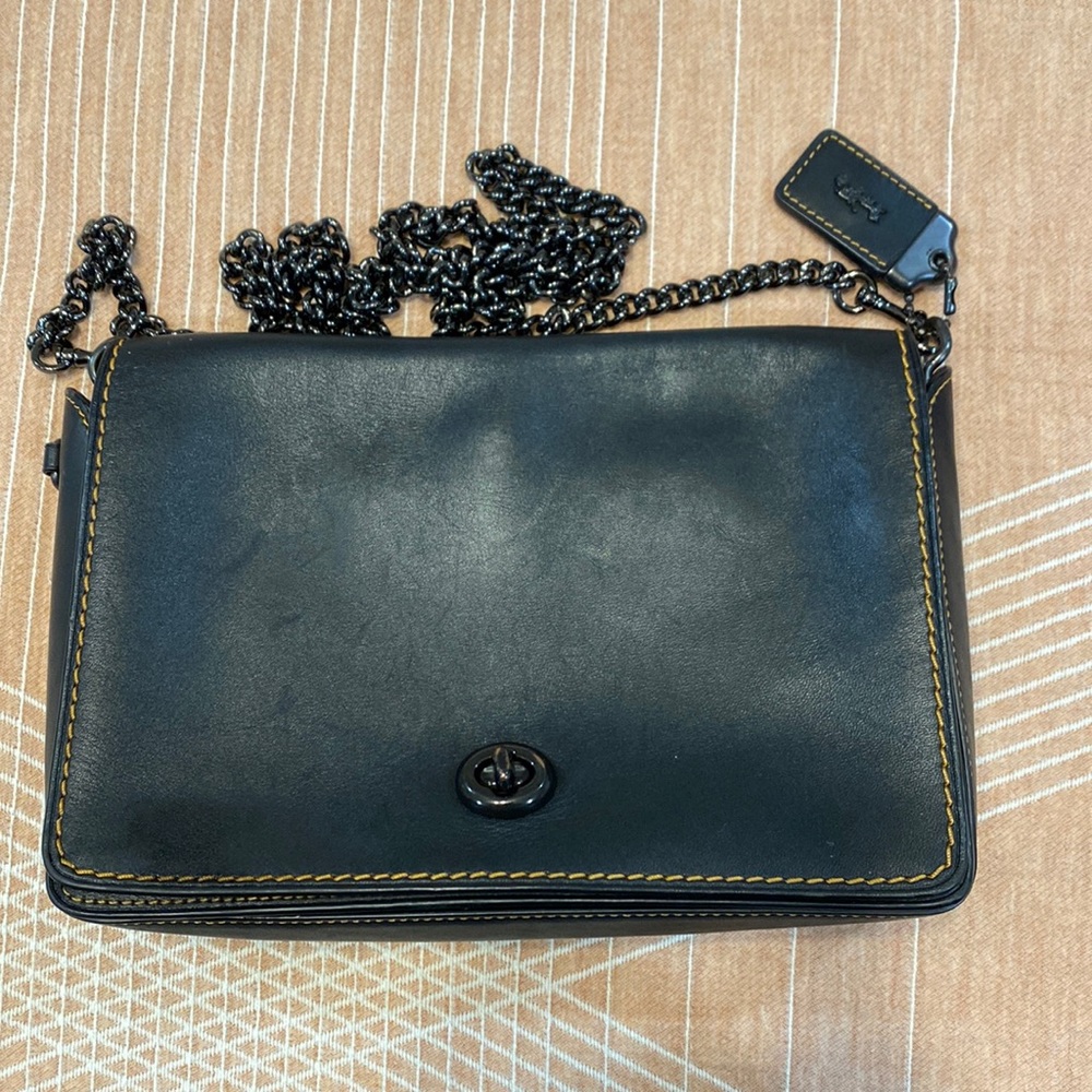 Black and brown coach cross over bag